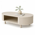 Ovaler Couchtisch 120 x 60 x 40 cm aus MDF mit Schiebetur in Creme